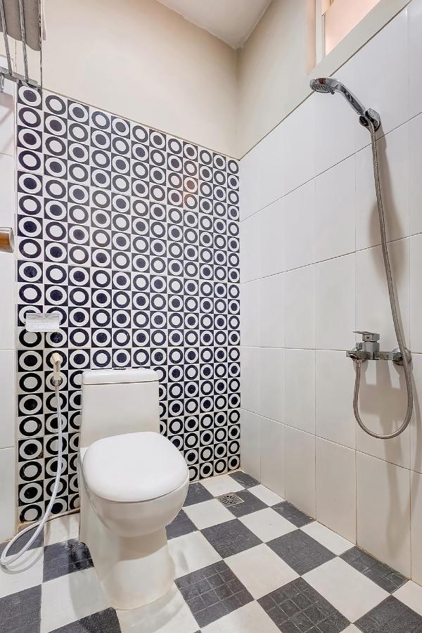 Oyo Flagship 3726 Tembok Batu Residence Tugu المظهر الخارجي الصورة