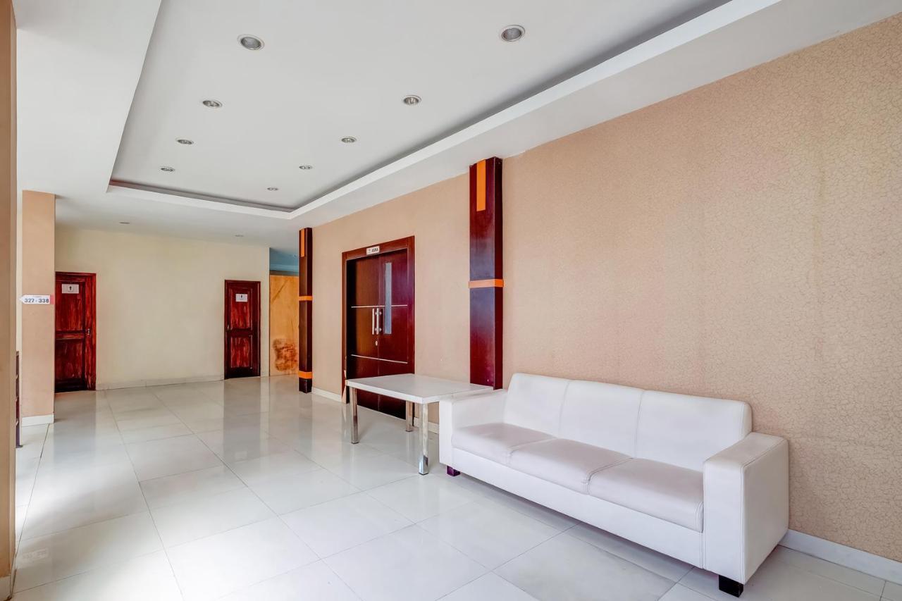 Oyo Flagship 3726 Tembok Batu Residence Tugu المظهر الخارجي الصورة