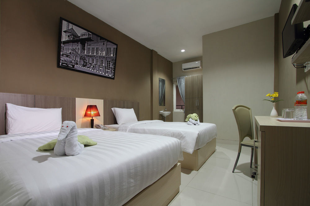 Oyo Flagship 3726 Tembok Batu Residence Tugu المظهر الخارجي الصورة